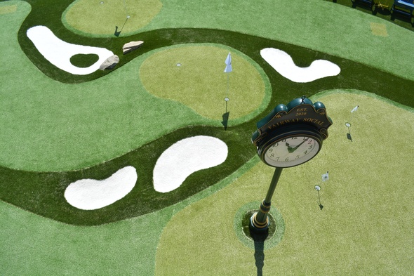 Kennewick Synthetic grass golf course with sand traps and golfers